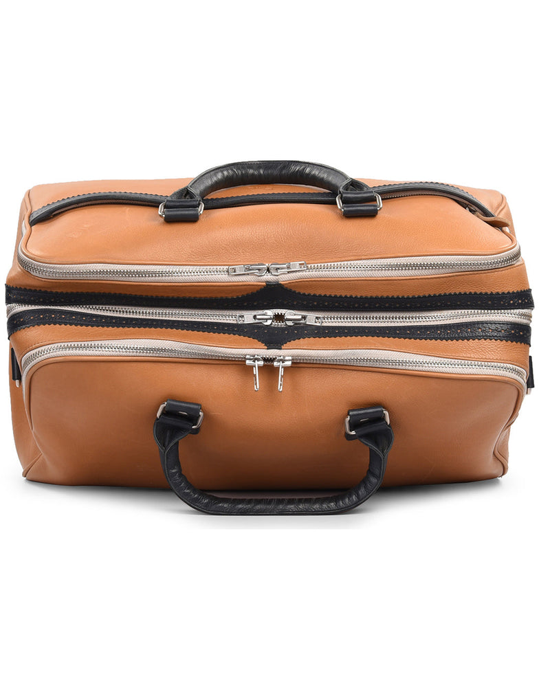 Grand sac de voyage en cuir de veau beige avec finitions bleu marine