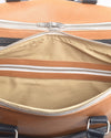 Grand sac de voyage en cuir de veau beige avec finitions bleu marine