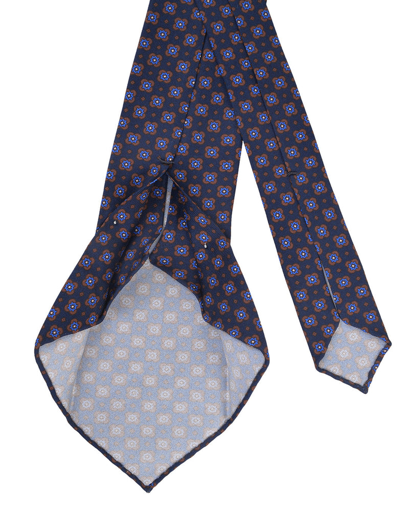 Brown und blaue Blumen auf Marine-Krawatte