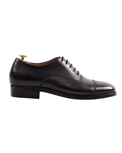 Chaussures Oxford noires à bout rapporté