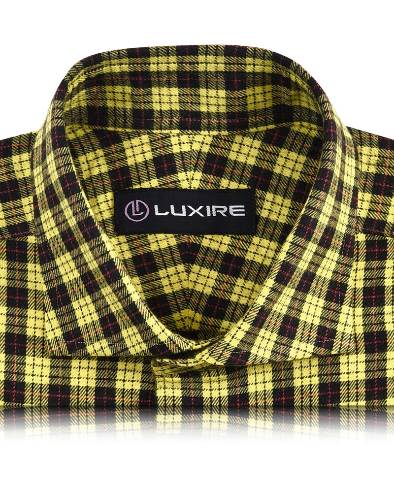 Gelber schwarzer Tattersall-Flanell