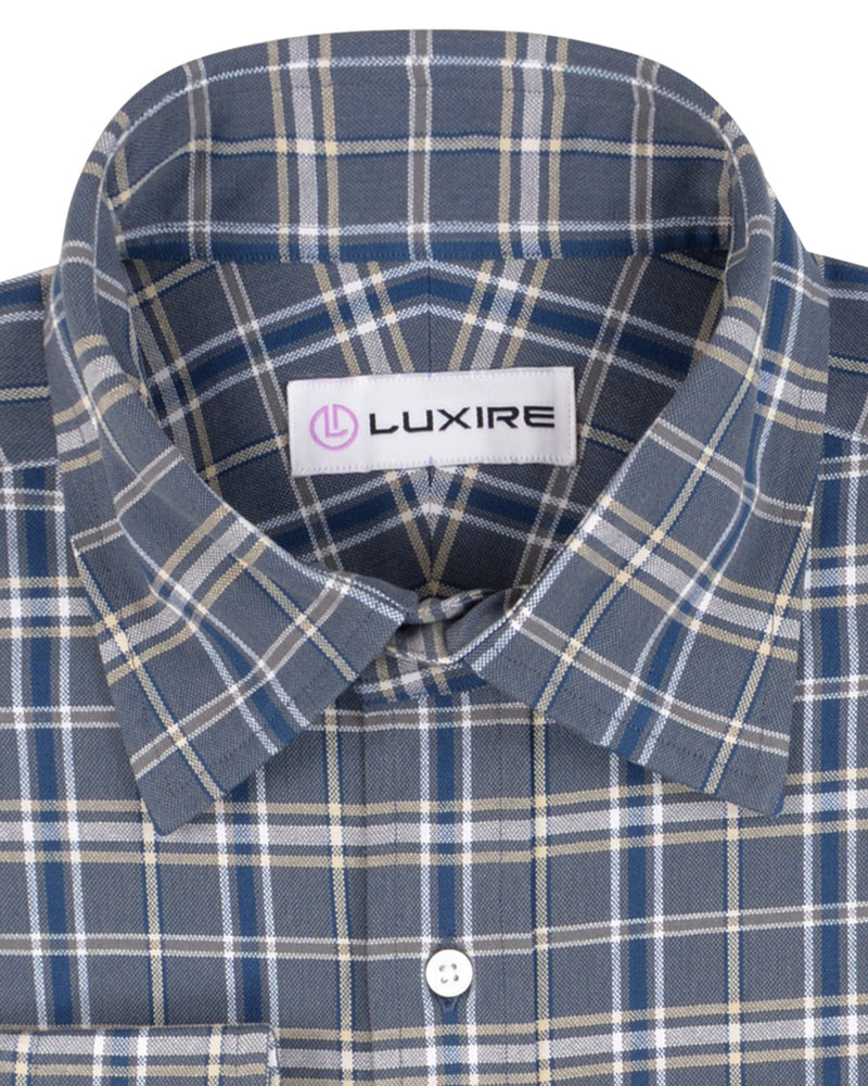 Graues, marineblaues, cremefarbenes Tartan-Karo-Oxford